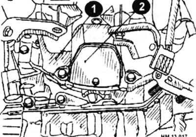 1 — масляный поддон двигателя; 2 — пылезащитная крышка.