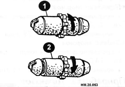 1 — тормозной механизм правого колеса; 2 — тормозной механизм левого колеса.