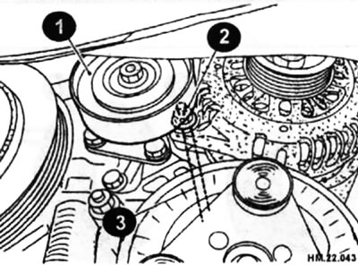 Открутите гайку крепления генератора (2) и сквозной болт (3).