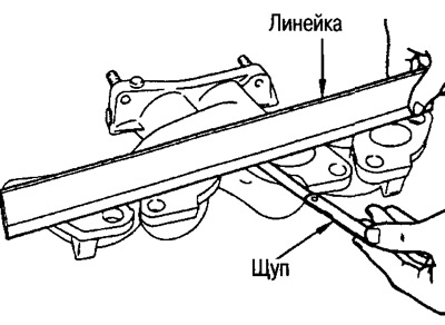 Пры дапамозе лінейкі і мац праверце коробление кантактнай паверхні выпускнога калектара.