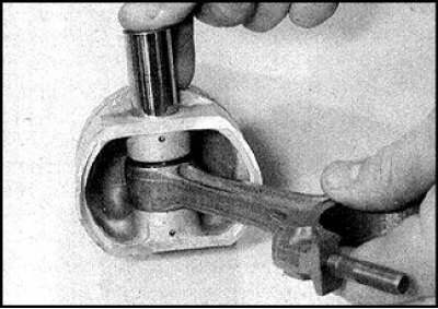 21. Orient the piston and connecting rod so that the mark on the part of the piston that should be…