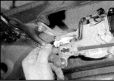 3. Disconnect the washer hose and remove the lever.