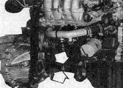 12.31 Гайка задняга мацавання і загваздка (адзначаны стрэлкамі) - таксама гл. фота 10.1 d